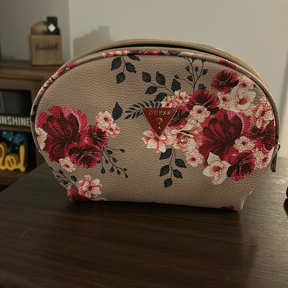 Guess? cosmetic bag.